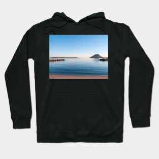 Landmark Mount Maunganui on horizon across Tauranga harbour at sunrise Hoodie